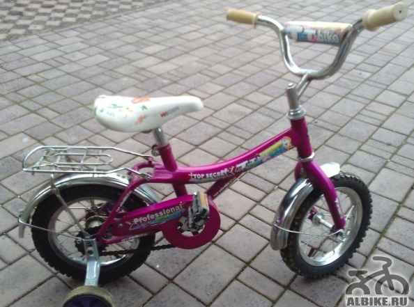 Детский велосипед 12" фиолетовый почти новый