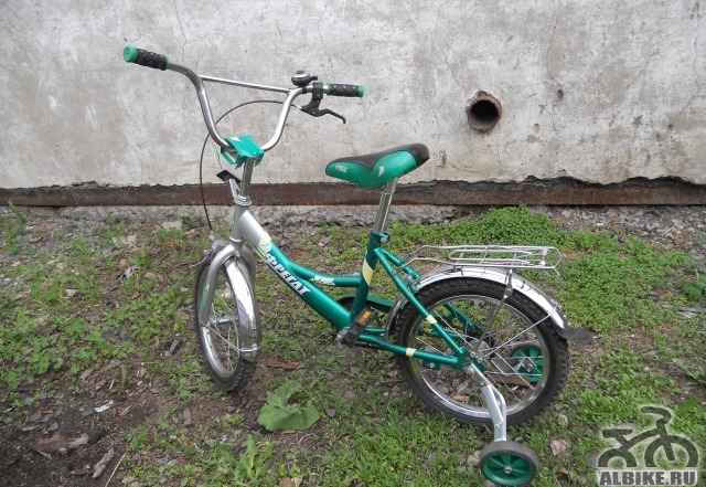Продам четырех колесный детский велосипед