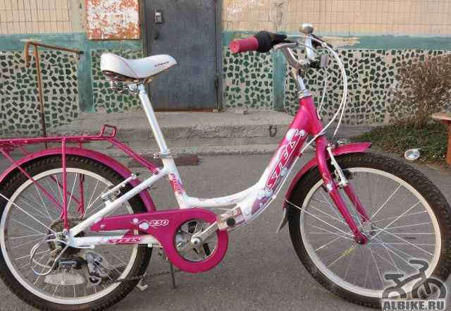 Велосипед Стелс Пилот 230 Girl (с допол колесами) - Фото #1