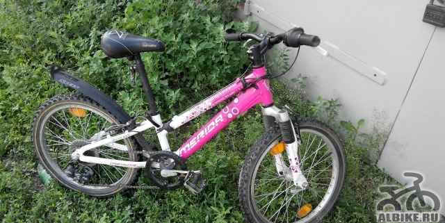 Продам велосипед скоростной merida розового цвета