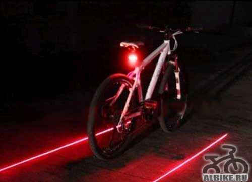 Продам задний красный велофонарь с лазерами - Фото #1