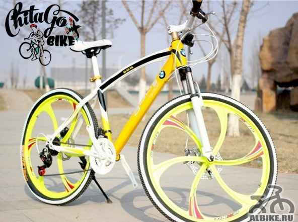 Велосипед БМВ желтый на литых дисках - Фото #1