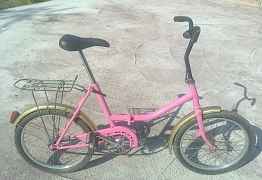 Розовый велосипед