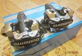 Контактные педали и ботинки Shimano
