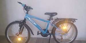 Подростковый велосипед btwin (125-150 см)